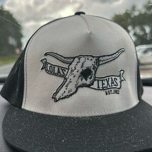 Lola’s Texas hat. Black and white. Found on St. Joseph State Park.